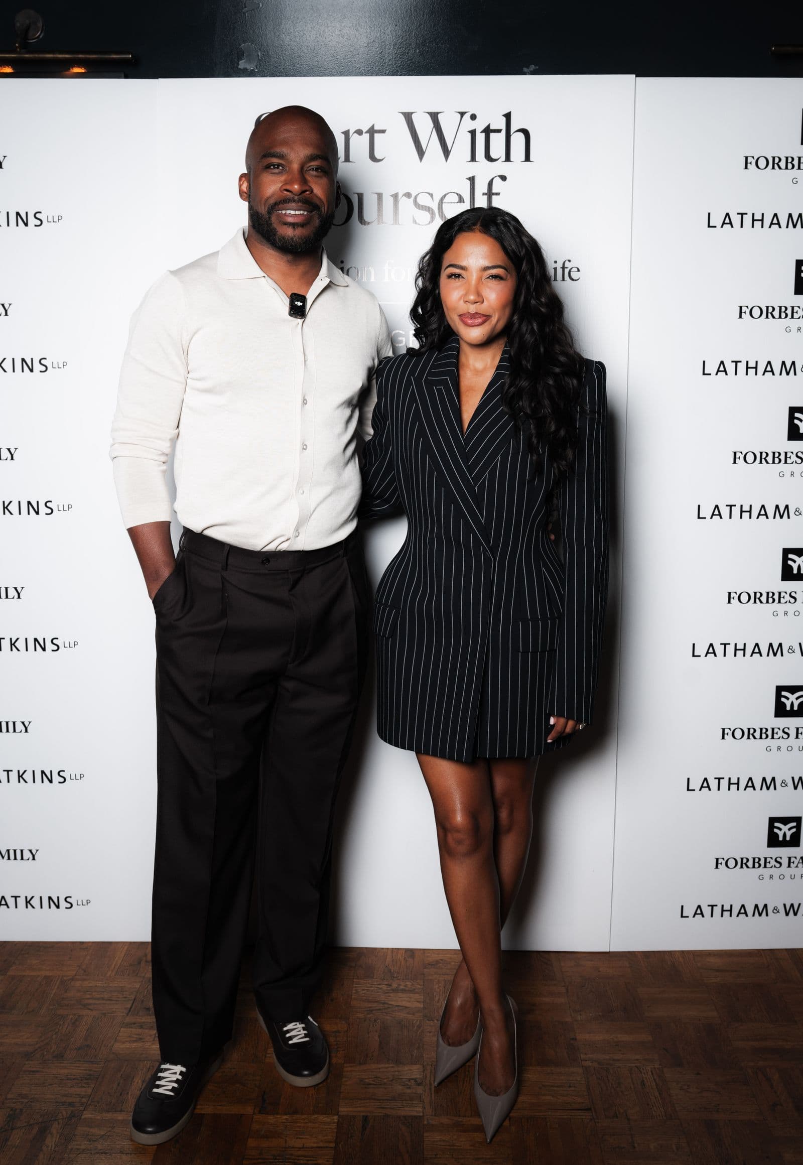 Forbes Family Group founders at an event